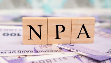 What is a non-performing asset (NPA) in real estate?